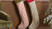 Oversized red and cream Christmas stockings with velvet trim