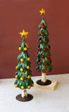 Set of two recycled metal Christmas trees with apples and lemons