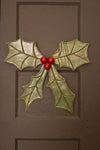 Handcrafted recycled metal holly wreath hanger for Christmas