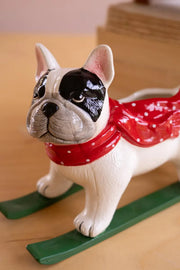 Whimsical ceramic skiing dog accent for Christmas tabletops and shelves