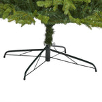 Black metal Christmas tree stand with a green artificial tree on a white background