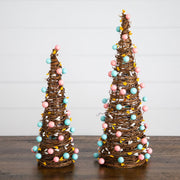 Twelve-inch and sixteen-inch artificial Easter trees for tabletop décor.