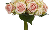 Bouquet of pink and white flowers with green leaves on a white background