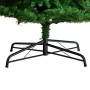 Black metal Christmas tree stand with a green artificial tree on a white background