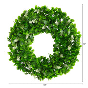 Green leaf wreath with measurements on a white background