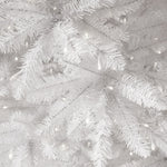 Close-up of a white Christmas tree with lights