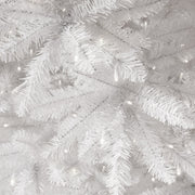 Close-up of a white Christmas tree with lights
