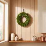Round preserved boxwood wreath with lush natural foliage