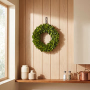 Round preserved boxwood wreath with lush natural foliage
