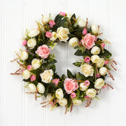 Floral wreath with pink and white flowers on a white wooden background
