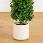 Green faux boxwood topiary in a white planter for home decoration