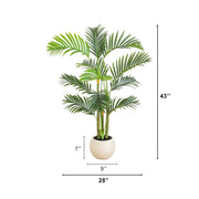 Artificial tropical palm in a white round planter for office décor