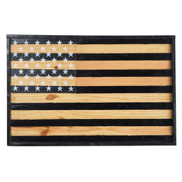 Wooden American flag with black and natural wood stripes on a white background