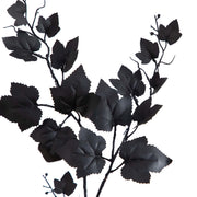 Black leafy branch on a white background