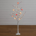 Nearly Natural 4-foot pre-lit artificial white twig tree with heart-shaped LED ornaments.