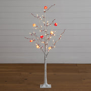 Nearly Natural 4-foot pre-lit artificial white twig tree with heart-shaped LED ornaments.