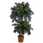 Potted artificial palm tree on a white background