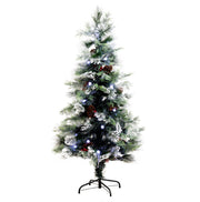 A pre-lit artificial Christmas tree with a white snow-dusted finish, decorated with pinecones and blue and white lights, standing on a black metal stand against a solid white background.