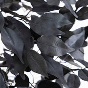 Black artificial ficus tree for spooky Halloween home decorations.