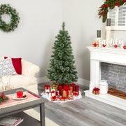 Decorated living room with Christmas tree, presents, and fireplace.