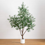 Potted artificial olive tree on a wooden floor with a white wall background