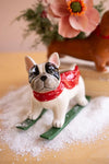 Festive Christmas dog figurine with ski-inspired holiday details