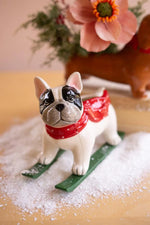 Set of 2 Ceramic Christmas Skiing Dog Tabletop Accents 9.5" H by Kalalou