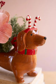 Christmas ceramic dog planter with candy cane accent for tabletop displays