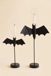 Two painted iron bat taper candle holders with elevated wing designs