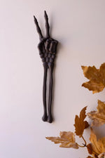 Kalalou rustic skeleton arm sculpture