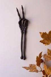 Kalalou rustic skeleton arm sculpture