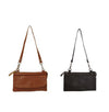 Brown leather handbags on a white background