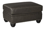 Benzara Fabric Upholstered Wooden Ottoman with Nail head Trims and Turned Legs, Gray