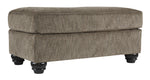 Benzara Contemporary Polyester Upholstered Wooden Ottoman with Turned Legs, Brown