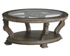 Benzara Traditional Oval Cocktail Table with Glass Top and Wooden Carvings, Brown