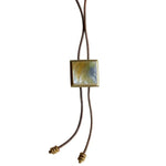 Benzara BM229272 Square Shape Pearl Accent Bolo Tie with Leather Cord, Brass