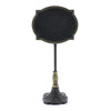 Benzara Oval Carved Metal Chalkboard Stand, Black and Brass