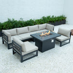 LeisureMod Chelsea 7-Piece Patio Sectional And Fire Pit Table Black Aluminum With Cushions