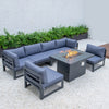 LeisureMod Chelsea 7-Piece Patio Sectional And Fire Pit Table Black Aluminum With Cushions